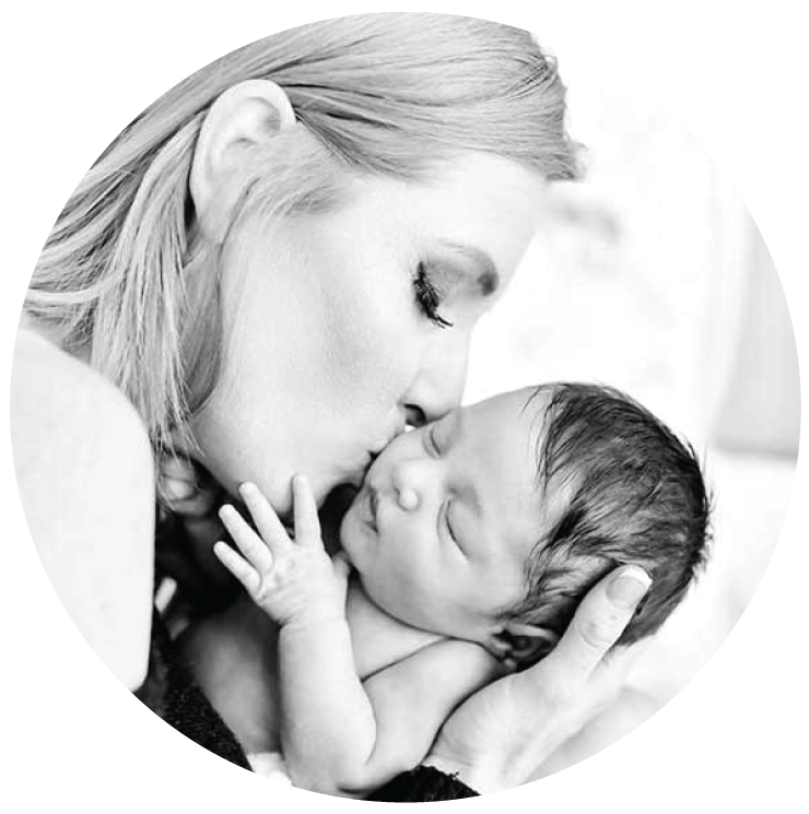 A mother holding her baby